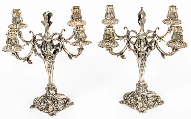 Lot 284: A PAIR OF PERUVIAN CAMUSSO FOUR-ARM CEREMONIAL CANDELABRA