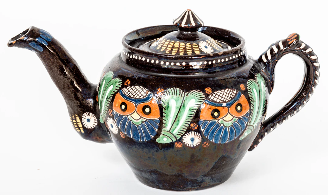 Lot 232: TEAPOT WITH OWL MOTIF