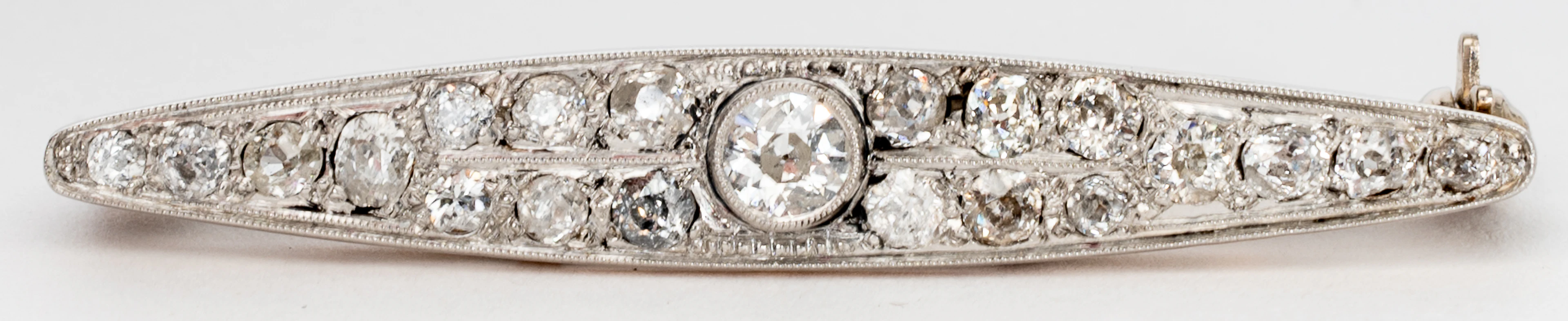 Lot 251: ART DECO BROOCH WITH CENTRAL OLD CUT-DIAMOND