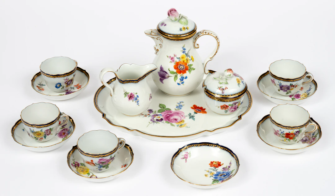 Lot 217: (125-1) MEISSEN MOCHA SERVICE WITH FLORAL DECOR AND ELEGANT BORDER