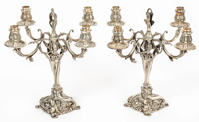 Lot 283: A PAIR OF PERUVIAN CAMUSSO FOUR-ARM CEREMONIAL CANDELABRA