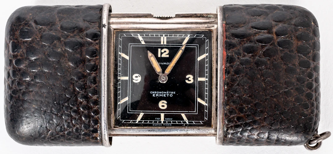 Lot 312: MOVADO ERMETO POCKET AND TRAVEL WATCH