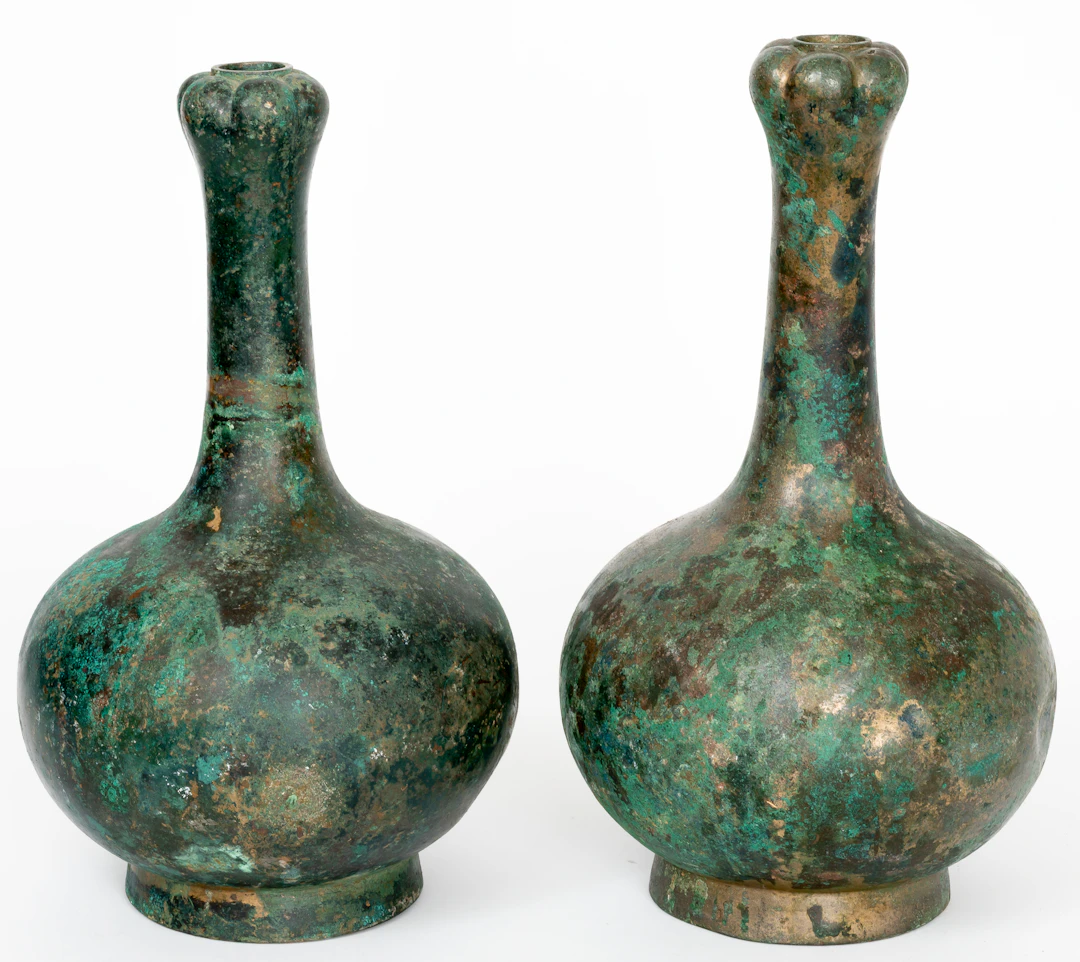 Lot 12: A PAIR OF BRONZE GARLIC-HEAD VASES