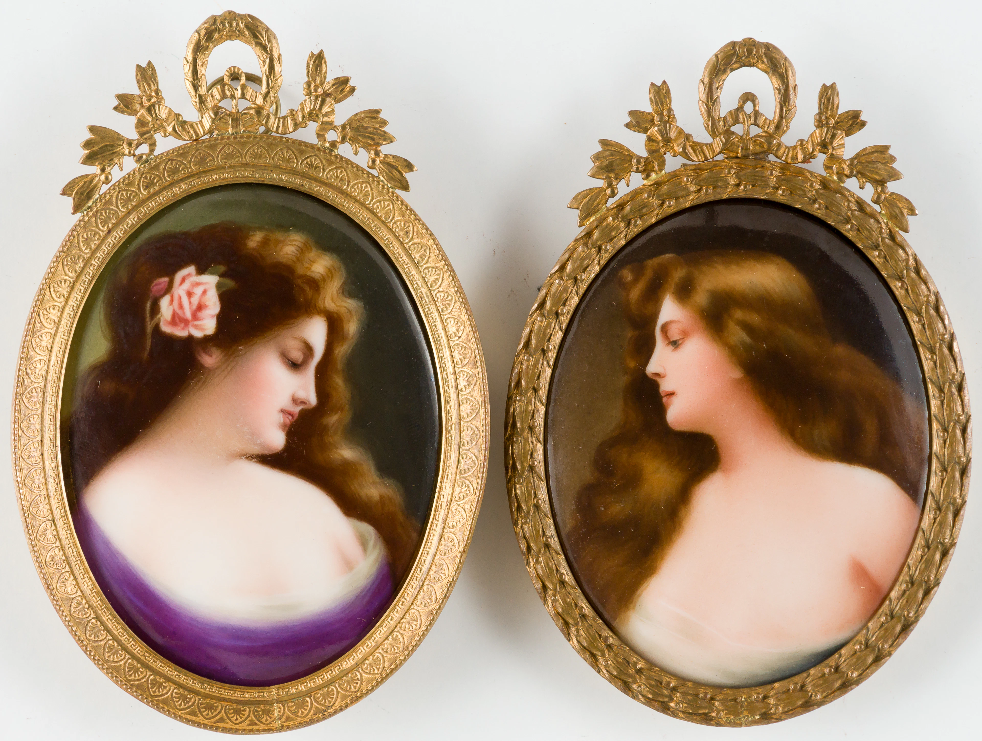 Lot 238: (120,121) A PAIR OF PORCELAIN PLAQUES WITH PORTRAITS OF YOUNG WOMEN