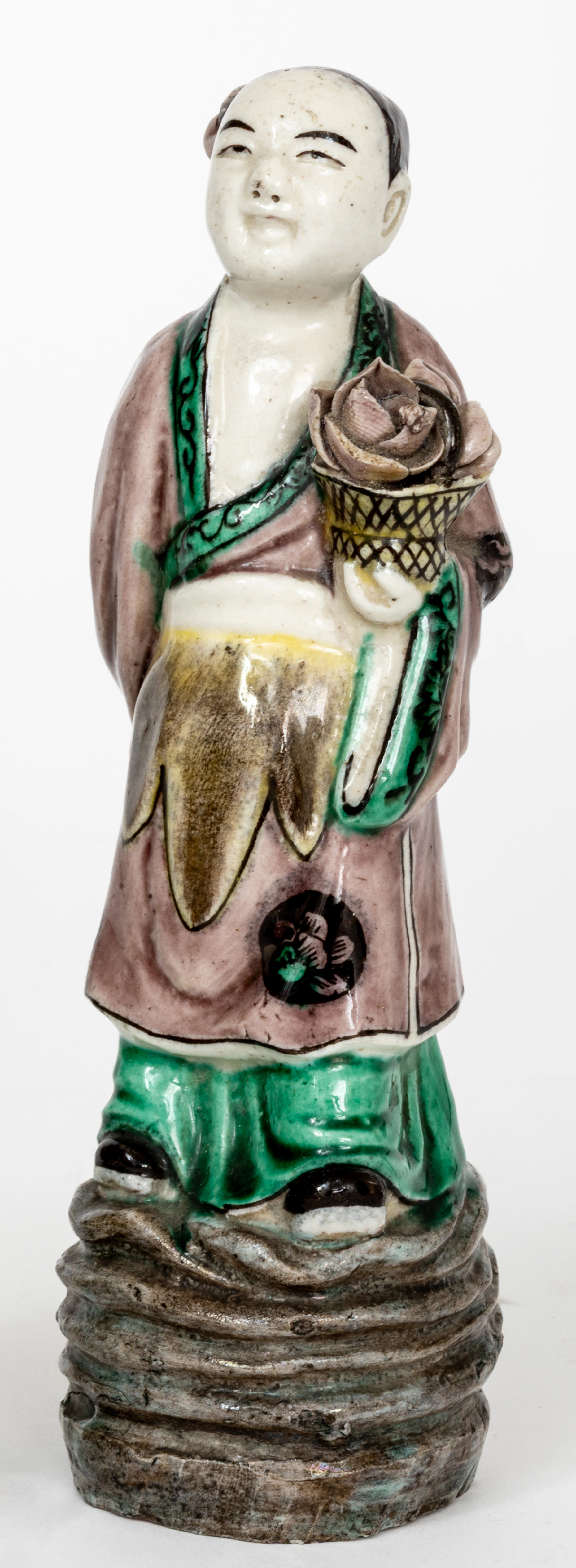 Lot 50: CHINESE STANDING PORCELAIN FIGURE HOLDING A BASKET WITH A LOTUS BLOSSOM