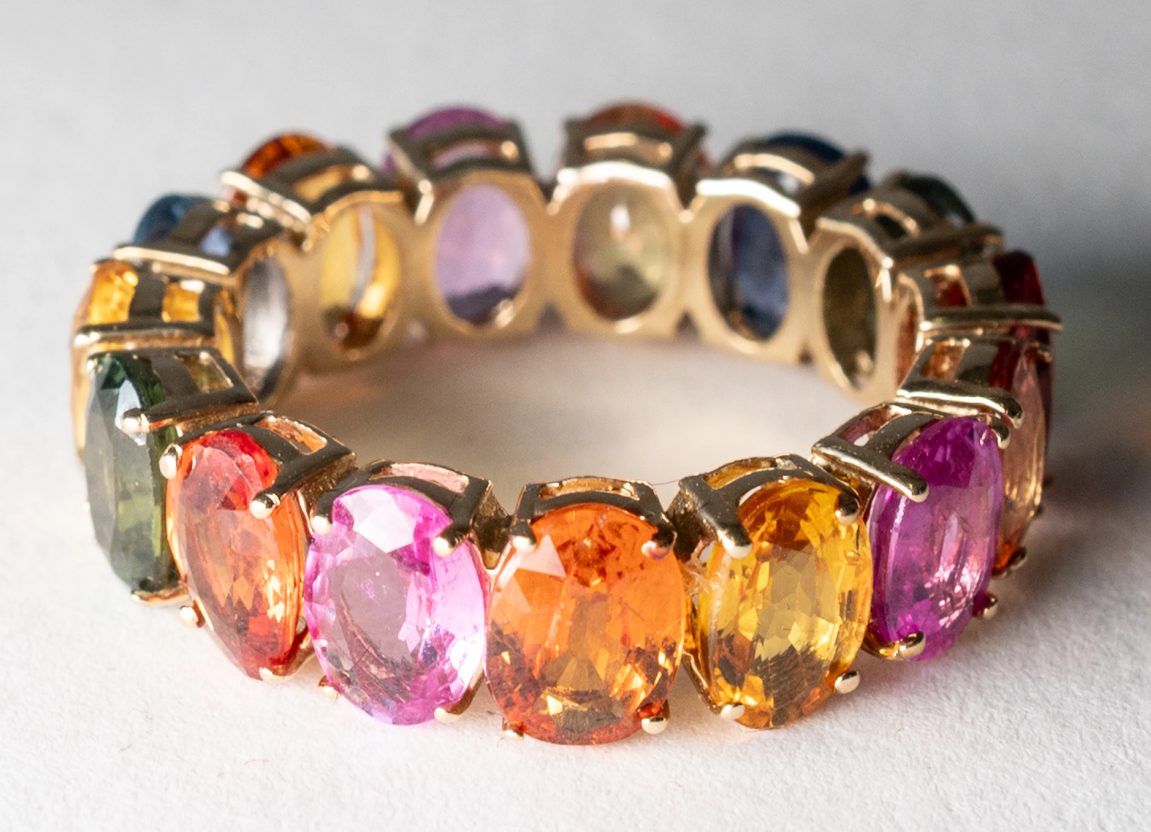 Lot 265: GOLD RING WITH 15 MULTICOLORED SAPPHIRES