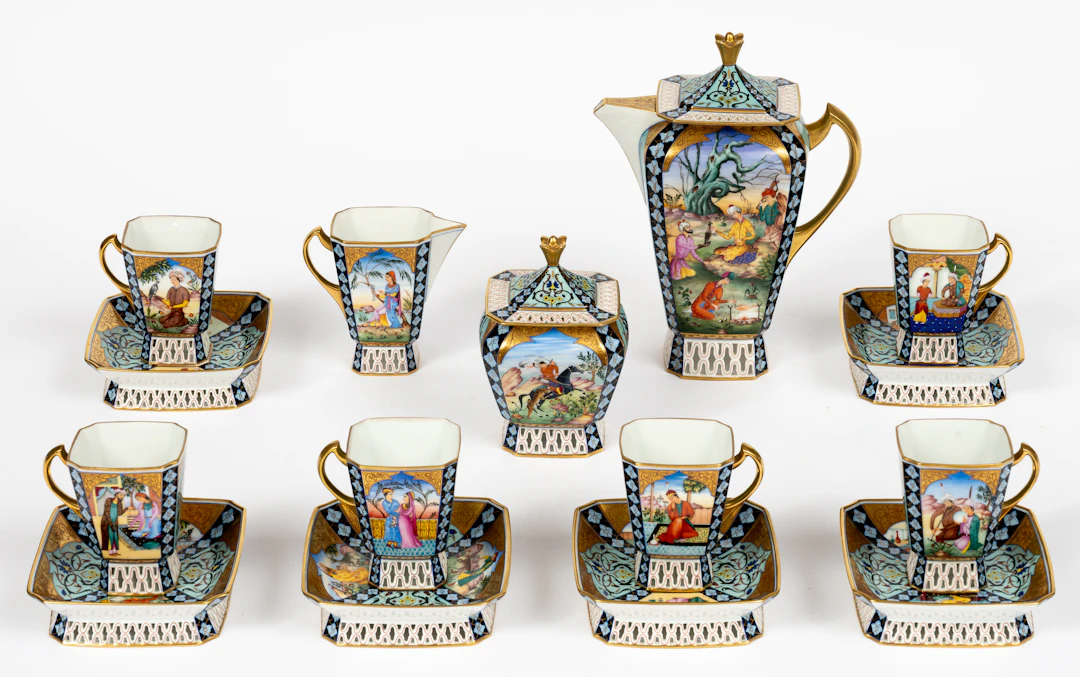 Lot 211: HEREND COFFEE SERVICE WITH PERSIAN-STYLE DECOR