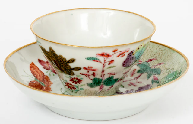 Lot 23: CHINESE PORCELAIN CUP AND SAUCER WITH FAMILLE-ROSE DECOR