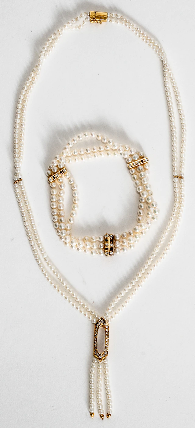 Lot 269: DOUBLE-STRAND PEARL NECKLACE AND THREE-STRAND BRACELET