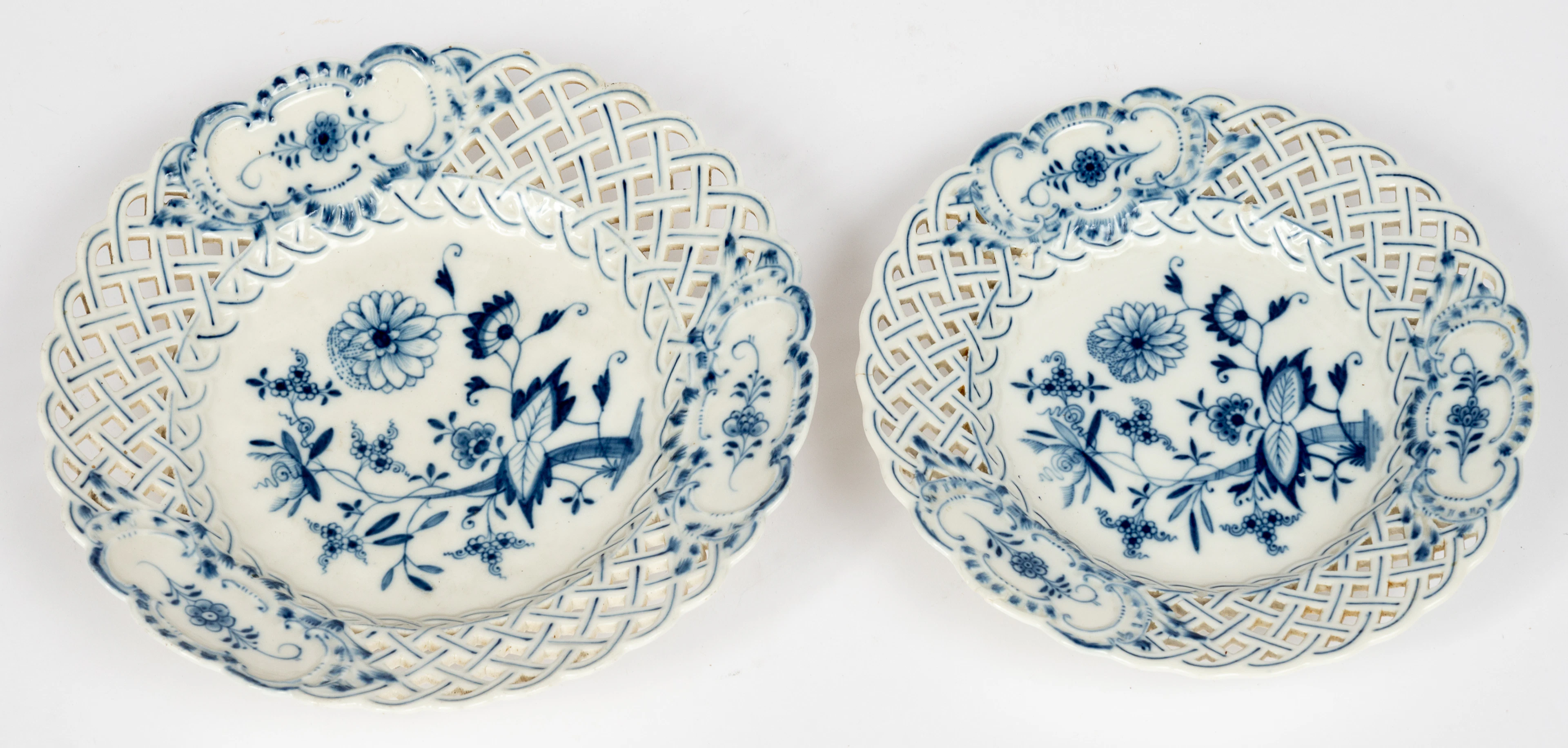 Lot 199: (45) 2 MEISSEN OPEN WORKED PLATES WITH ONION PATTERN DECORATION