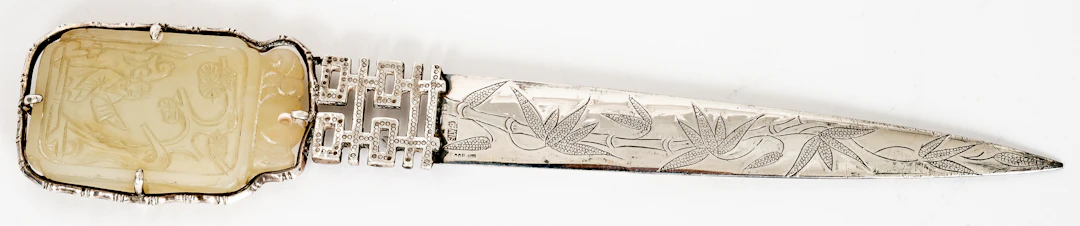 Lot 64: CHINESE SILVER LETTER OPENER WITH JADE HANDLE