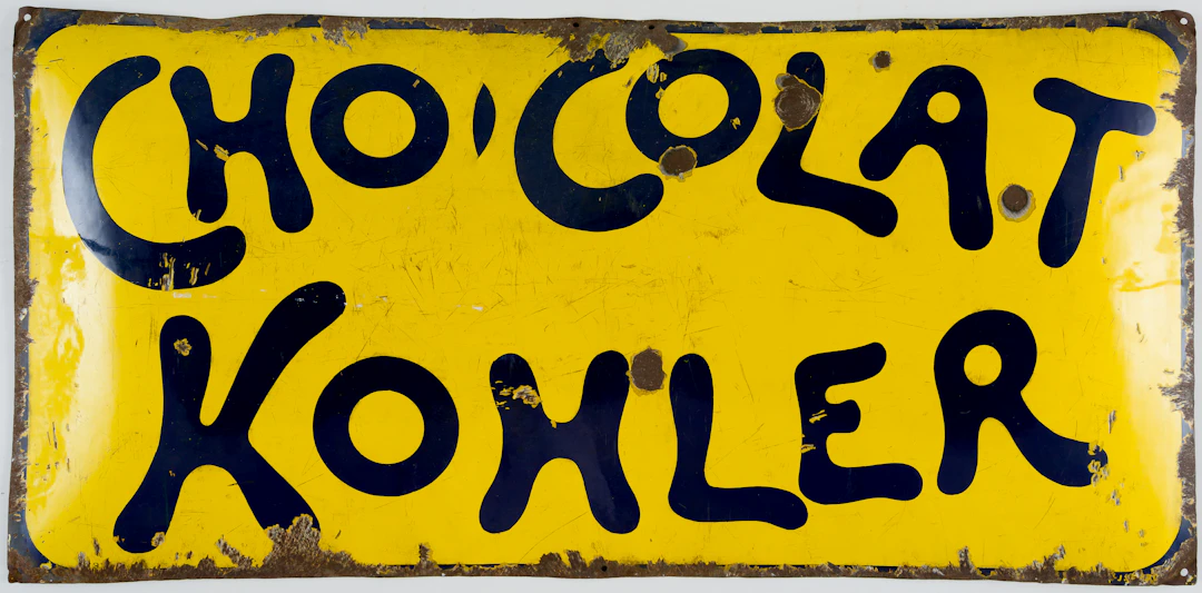 Lot 385: VERY LARGE ENAMEL SIGN FOR THE BRAND CHOCOLAT KOHLER