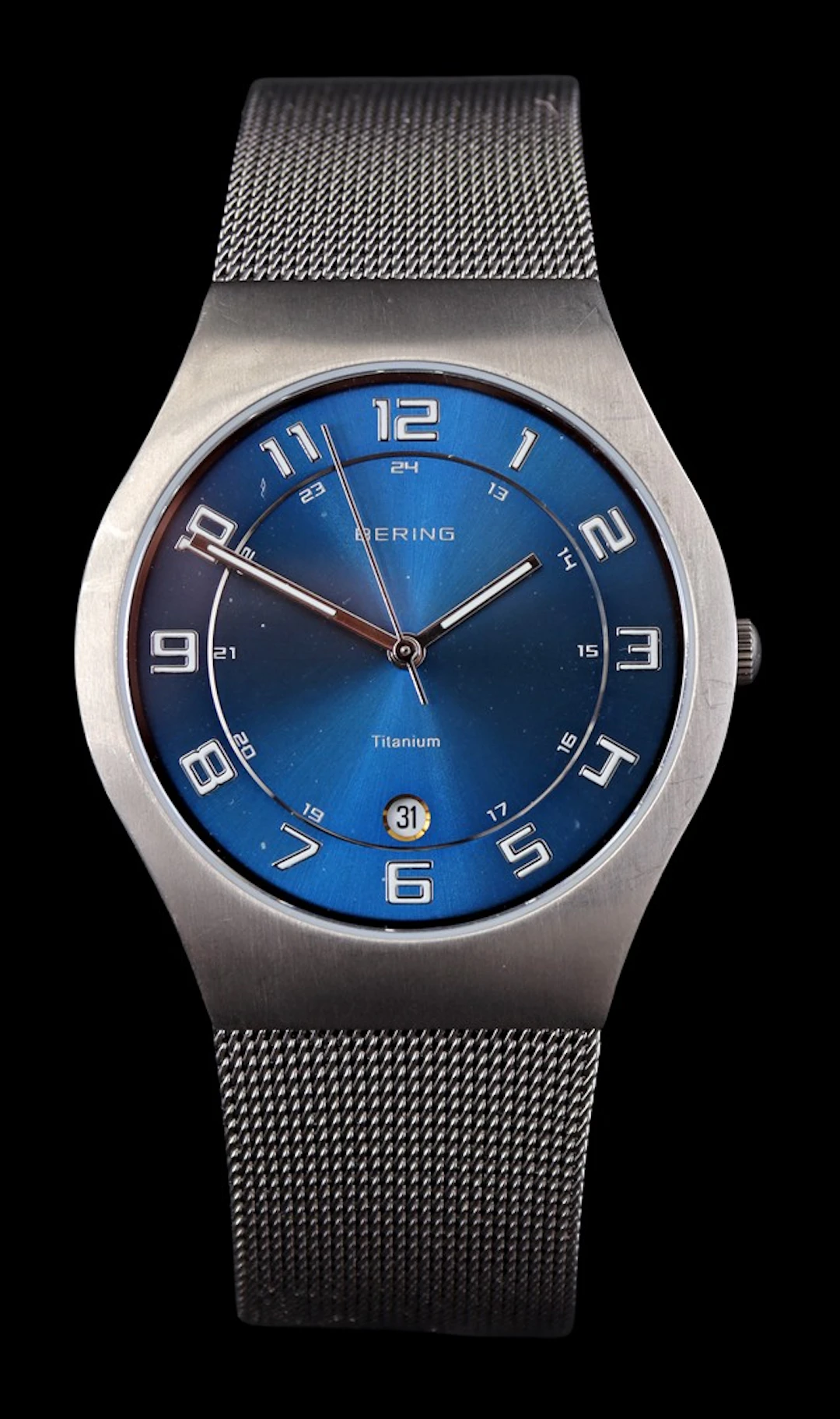 Bering heren polshorloge aan titanium band