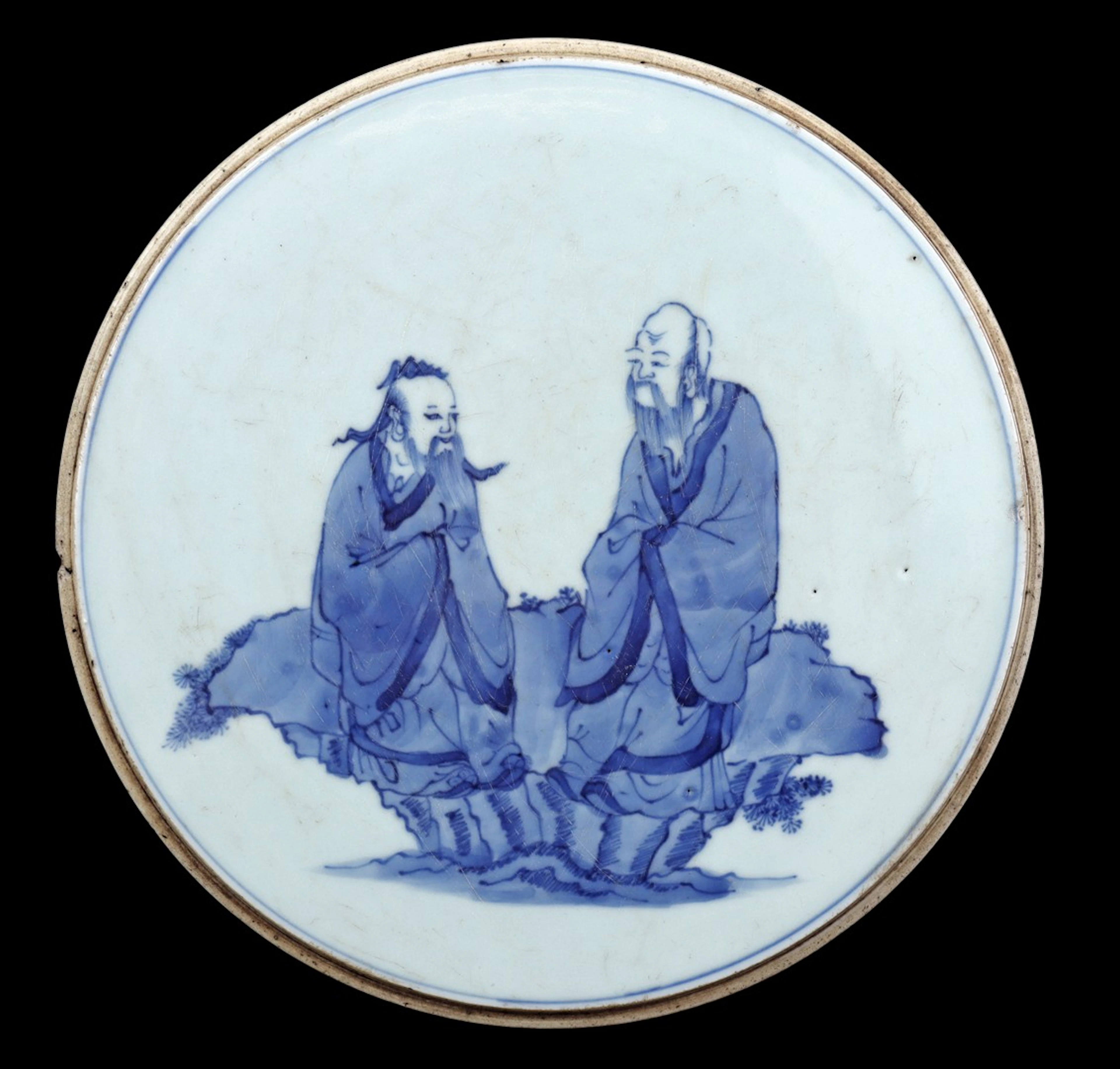 Porseleinen plaquette met blauw decor van 2 wijsgeren