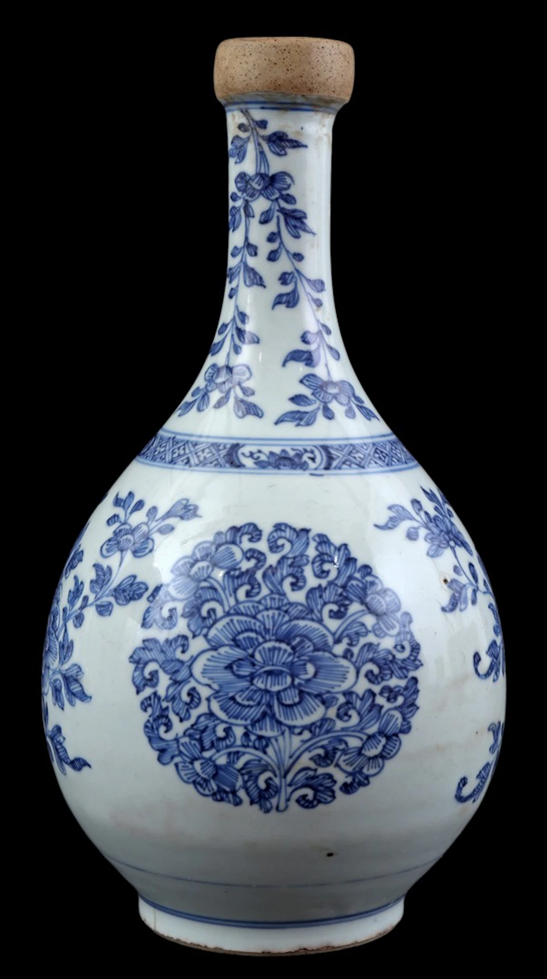 Porseleinen vaas met blauw floraal decor en ongeglazuurde hals