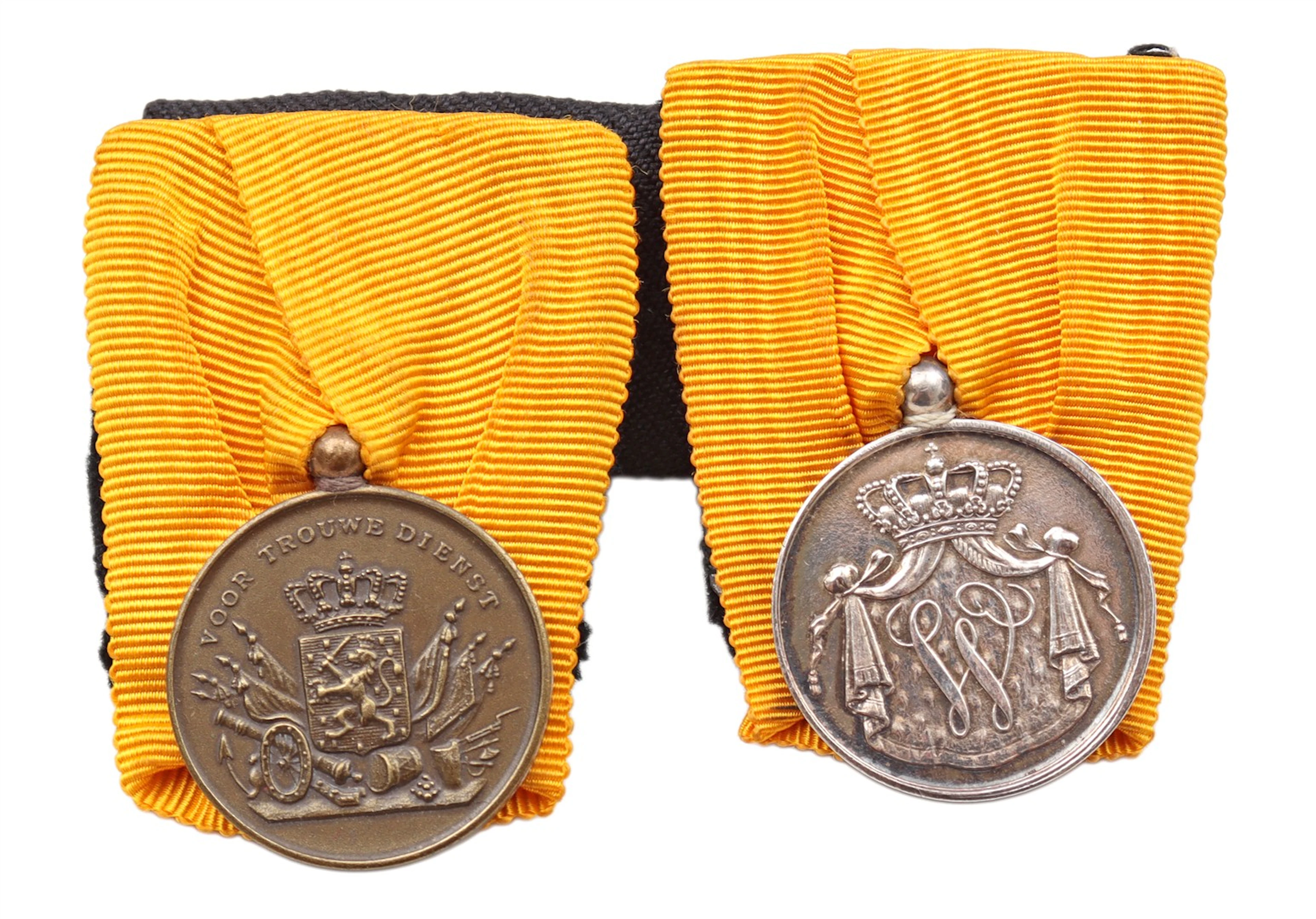 Zilveren en bronzen medaille voor trouwe dienst