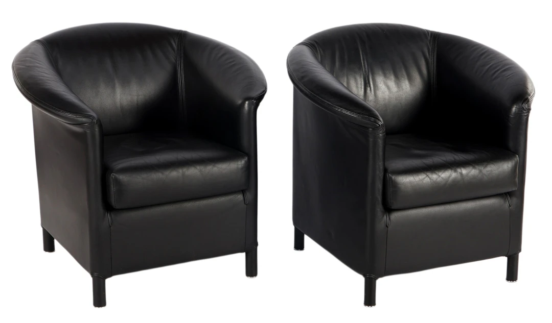 2 zwart lederen fauteuils