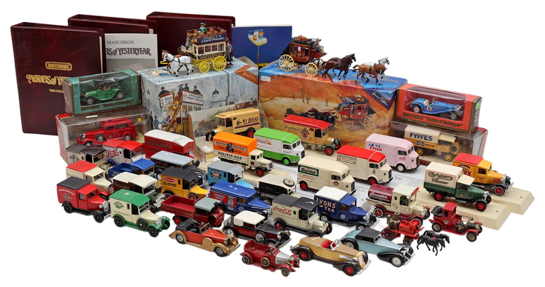 40 Matchbox schaalmodellen van auto's en paard-en-wagens...
