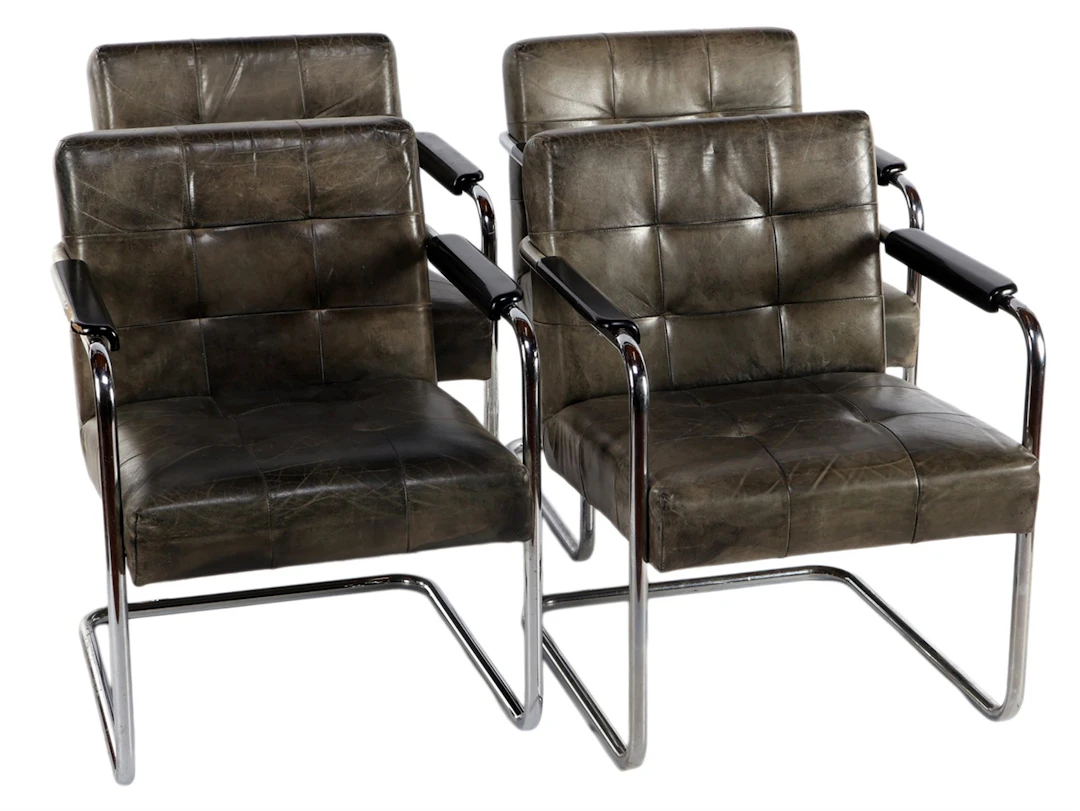 4 buisframe stoelen met lederen kussen en rugleuning