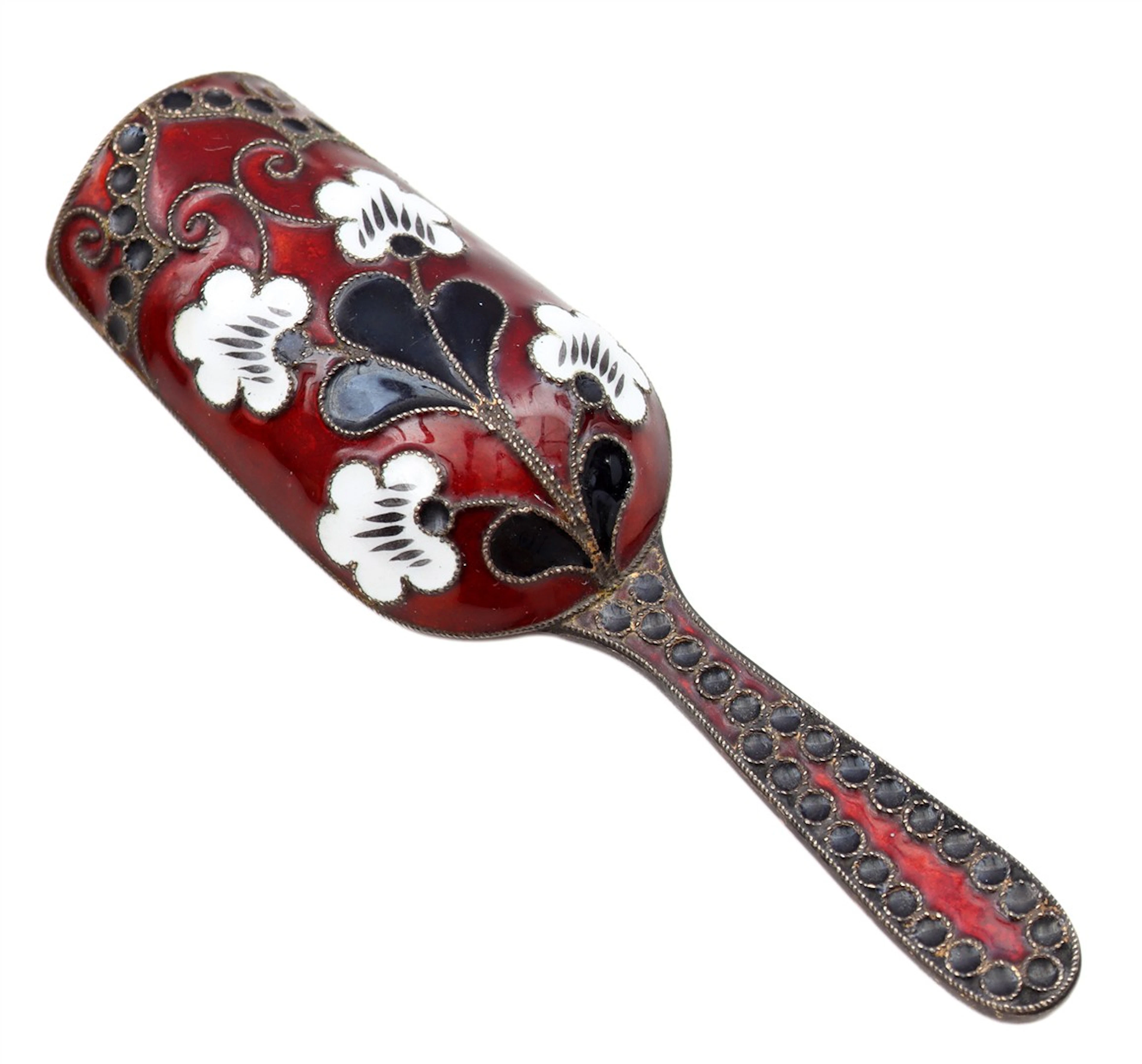 Geëmailleerde suikerschep met floraal decor