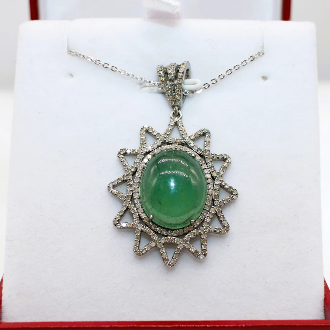 TOURMALINE & DIAMOND PENDANT NECKLACE.