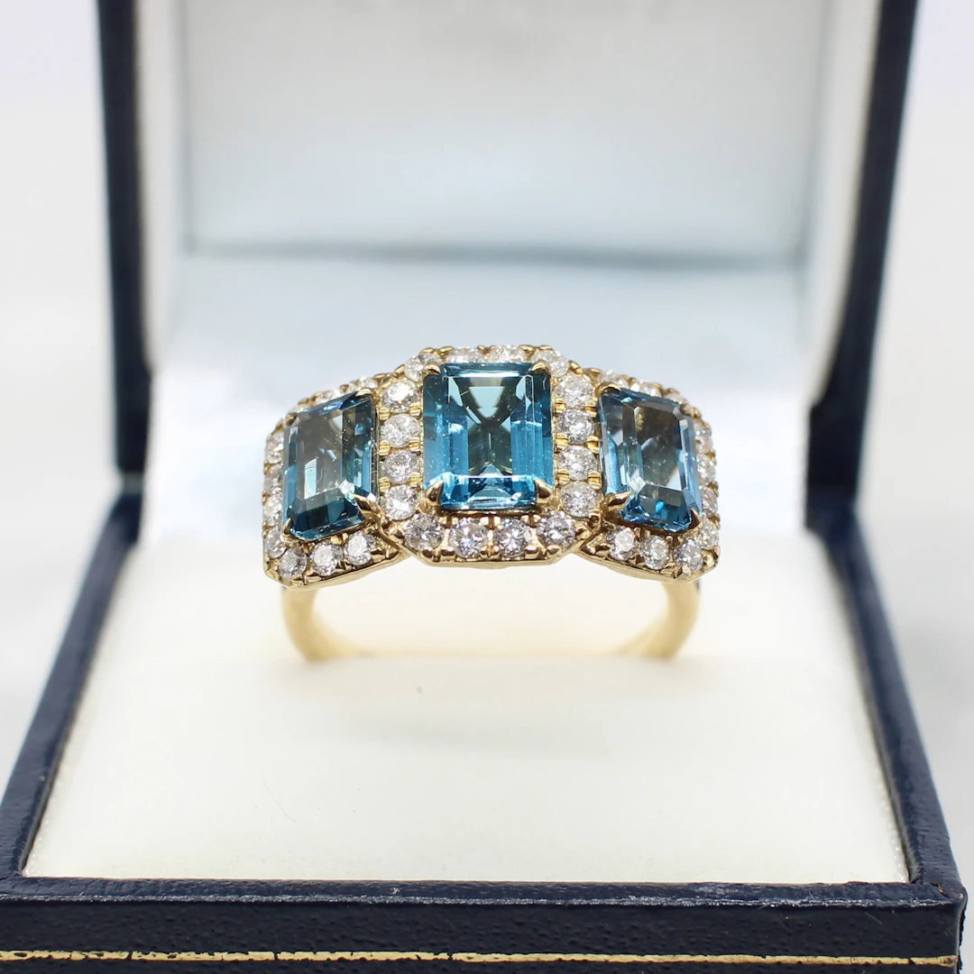 LARGE LONDON BLUE TOPAZ TRILOGY RING.