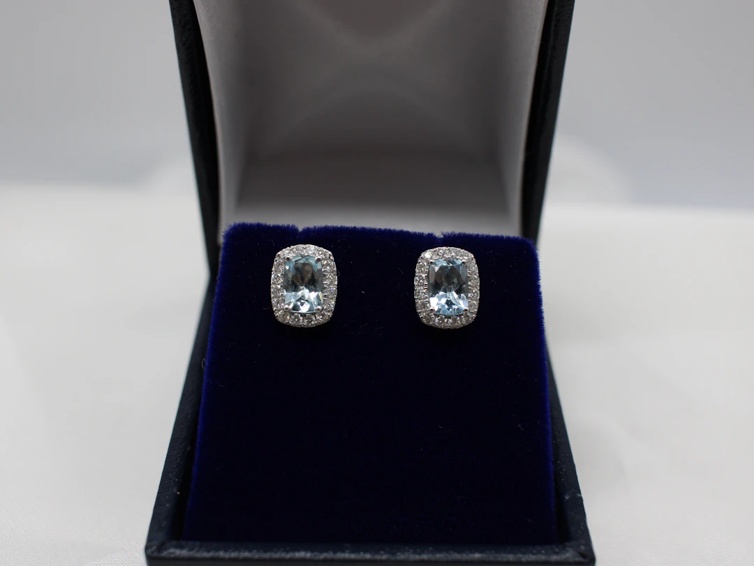 9K GOLD, AQUAMARINE & DIAMOND EAR STUDS.