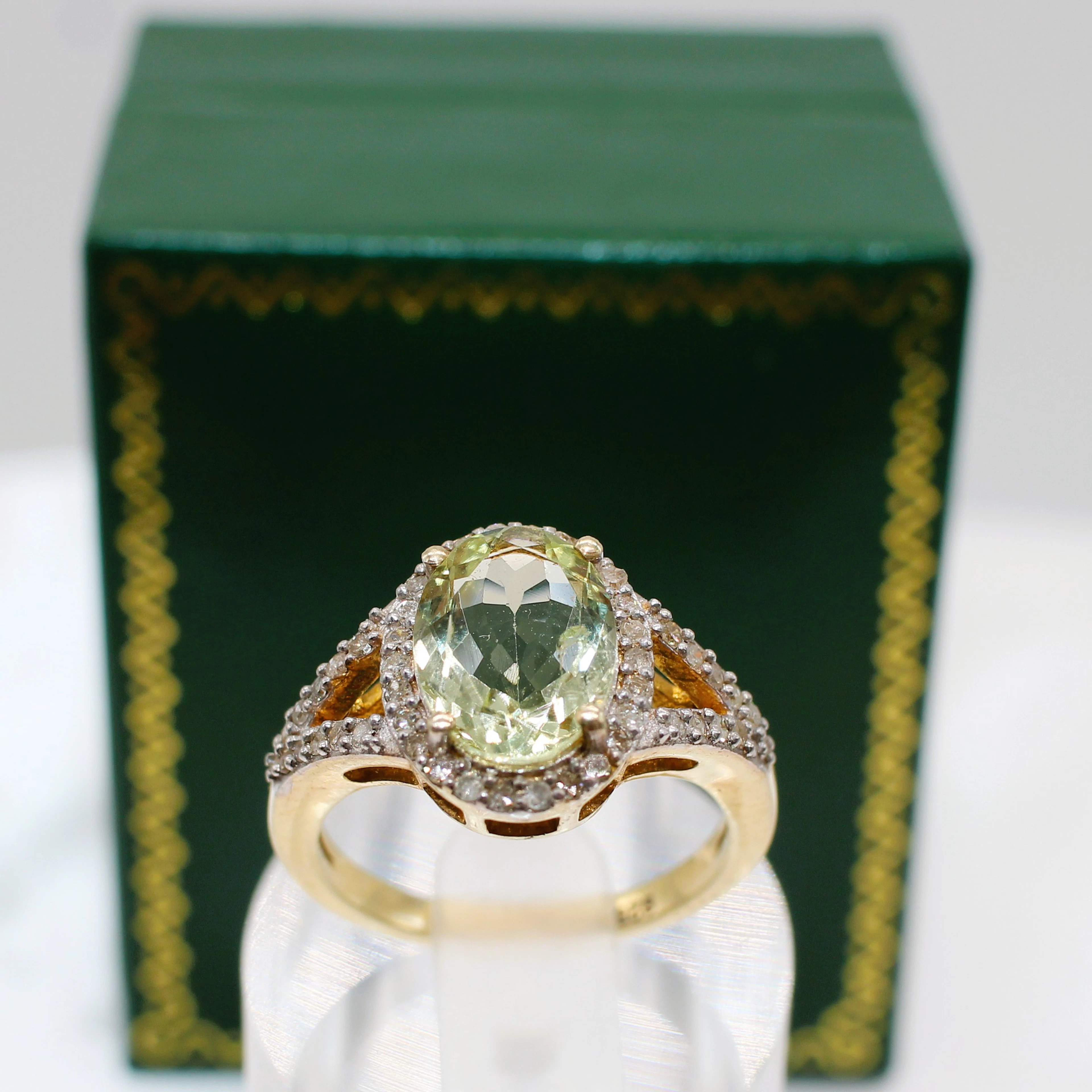 GREEN BERYL & DIAMOND RING.
