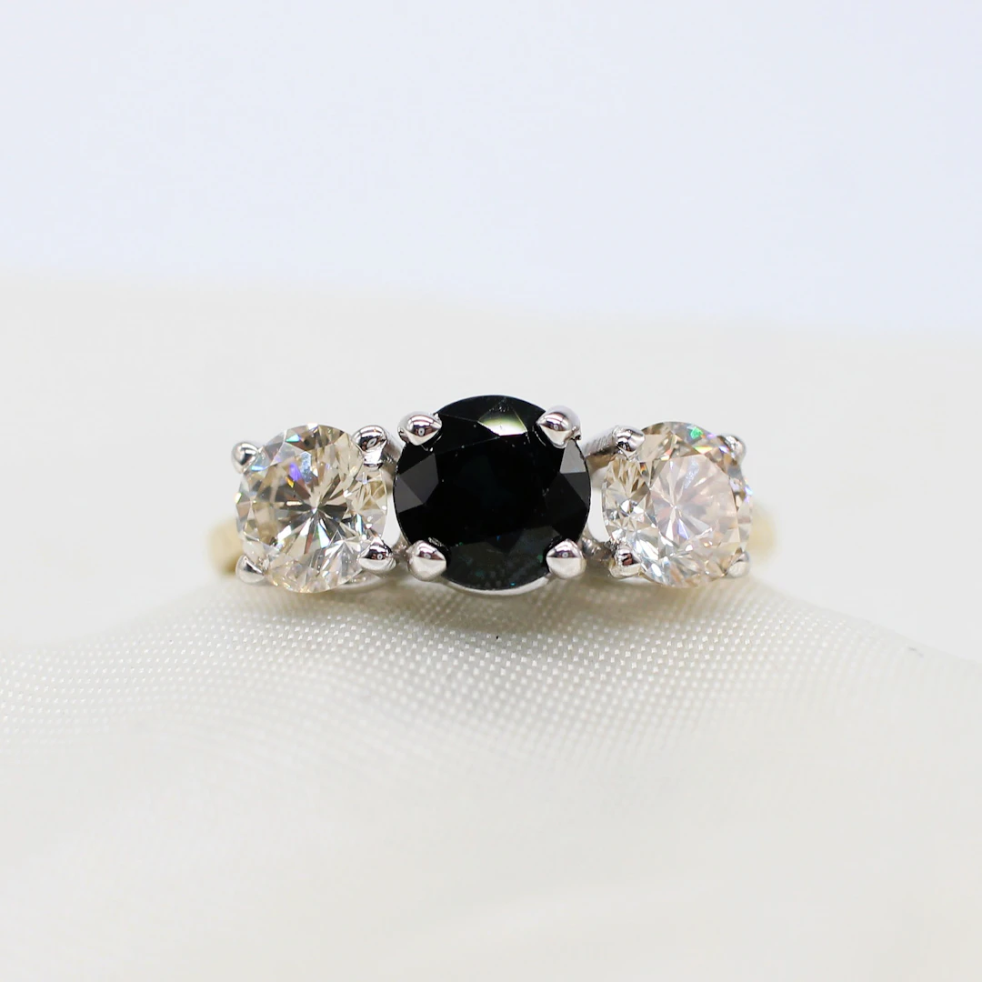 CERTIFIED SAPPHIRE & DIAMOND TRILOGY RING.