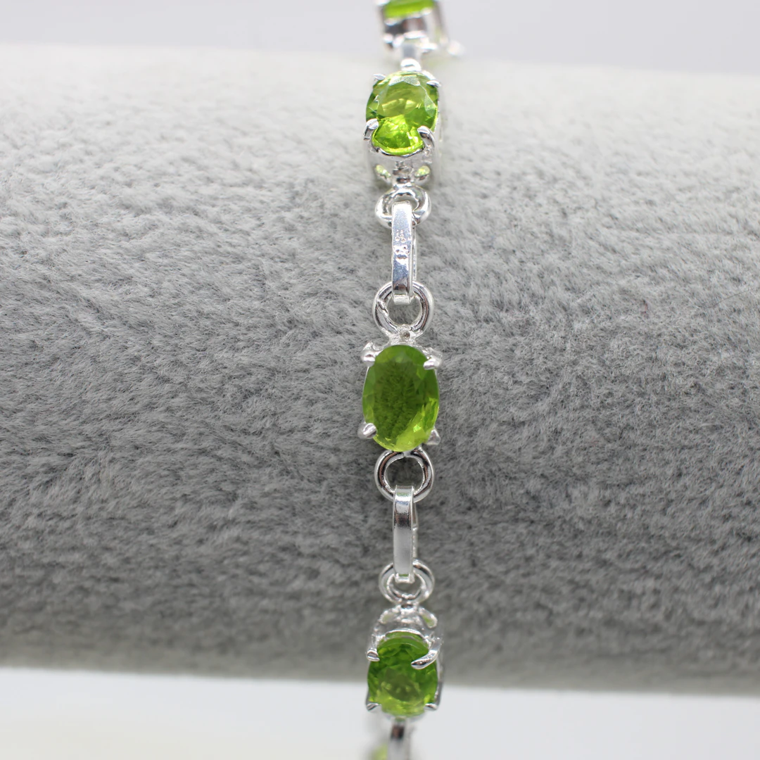 PERIDOT SET SILVER BRACELET.