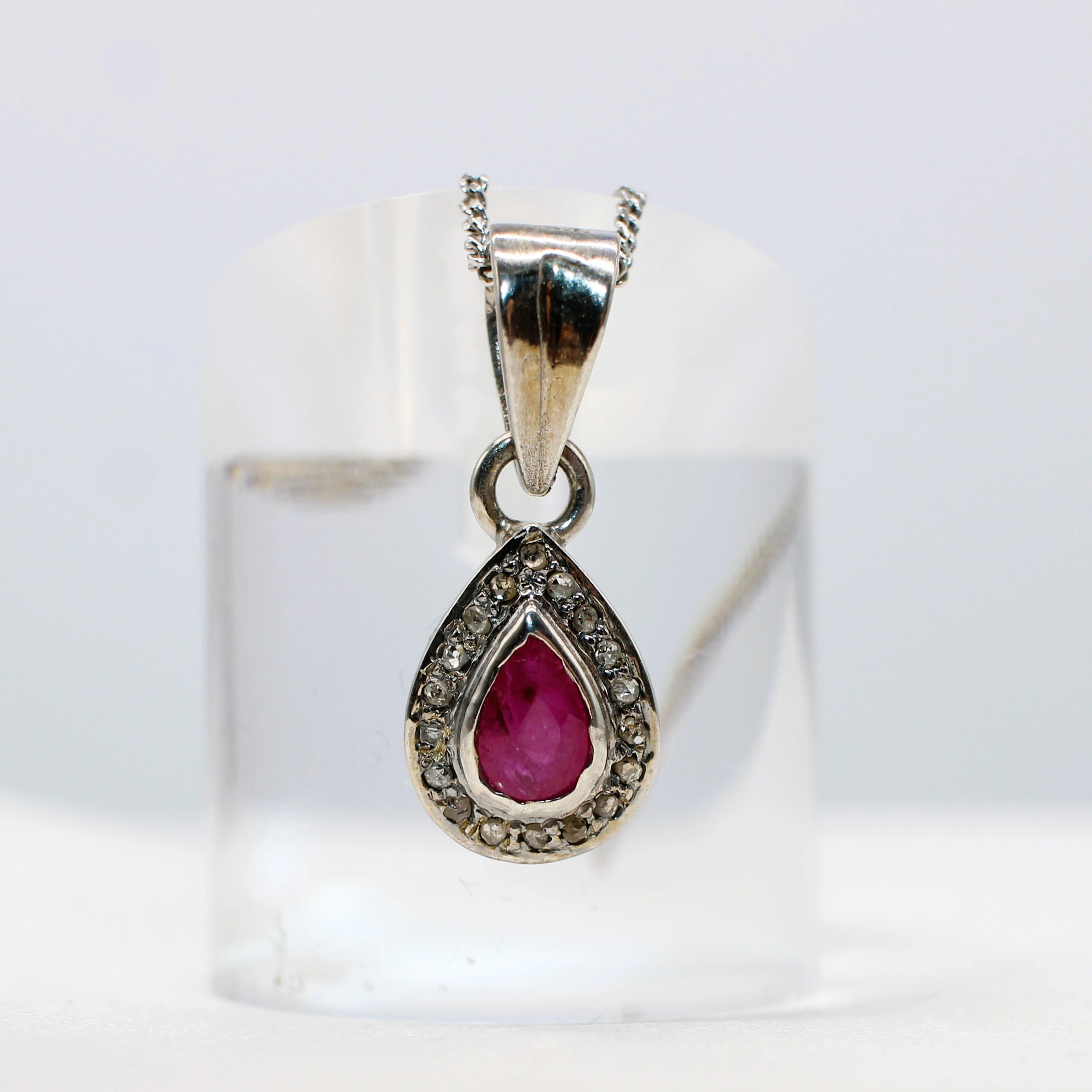 RUBY & DIAMOND SILVER NECKLACE.