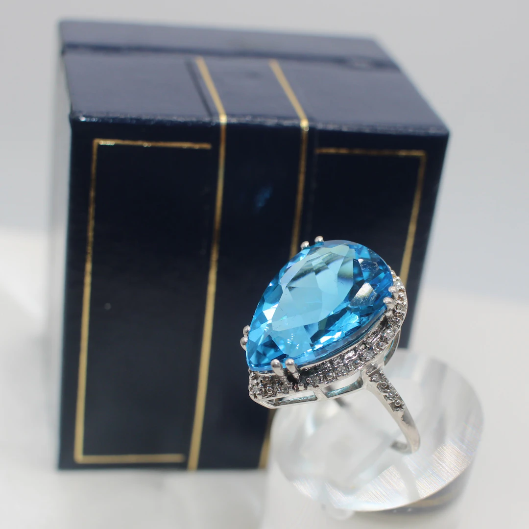 LARGE TOPAZ & DIAMOND RING.