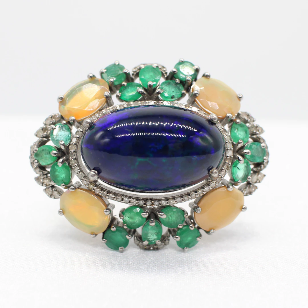 OPAL, EMERALD & DIAMOND BROOCH.