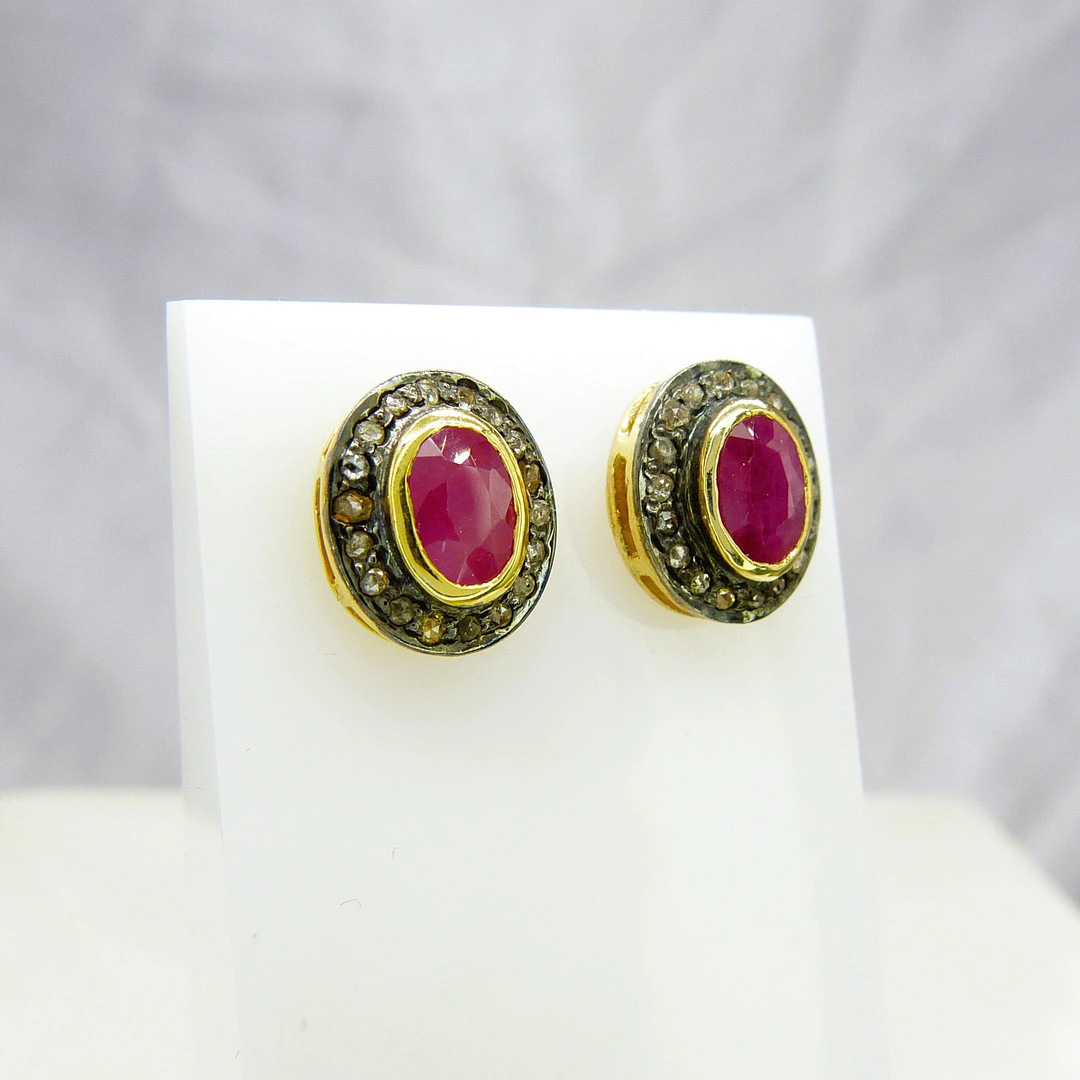 RUBY & DIAMOND EAR STUDS.
