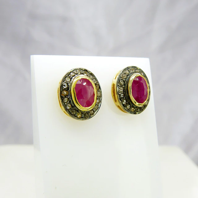 RUBY & DIAMOND EAR STUDS.