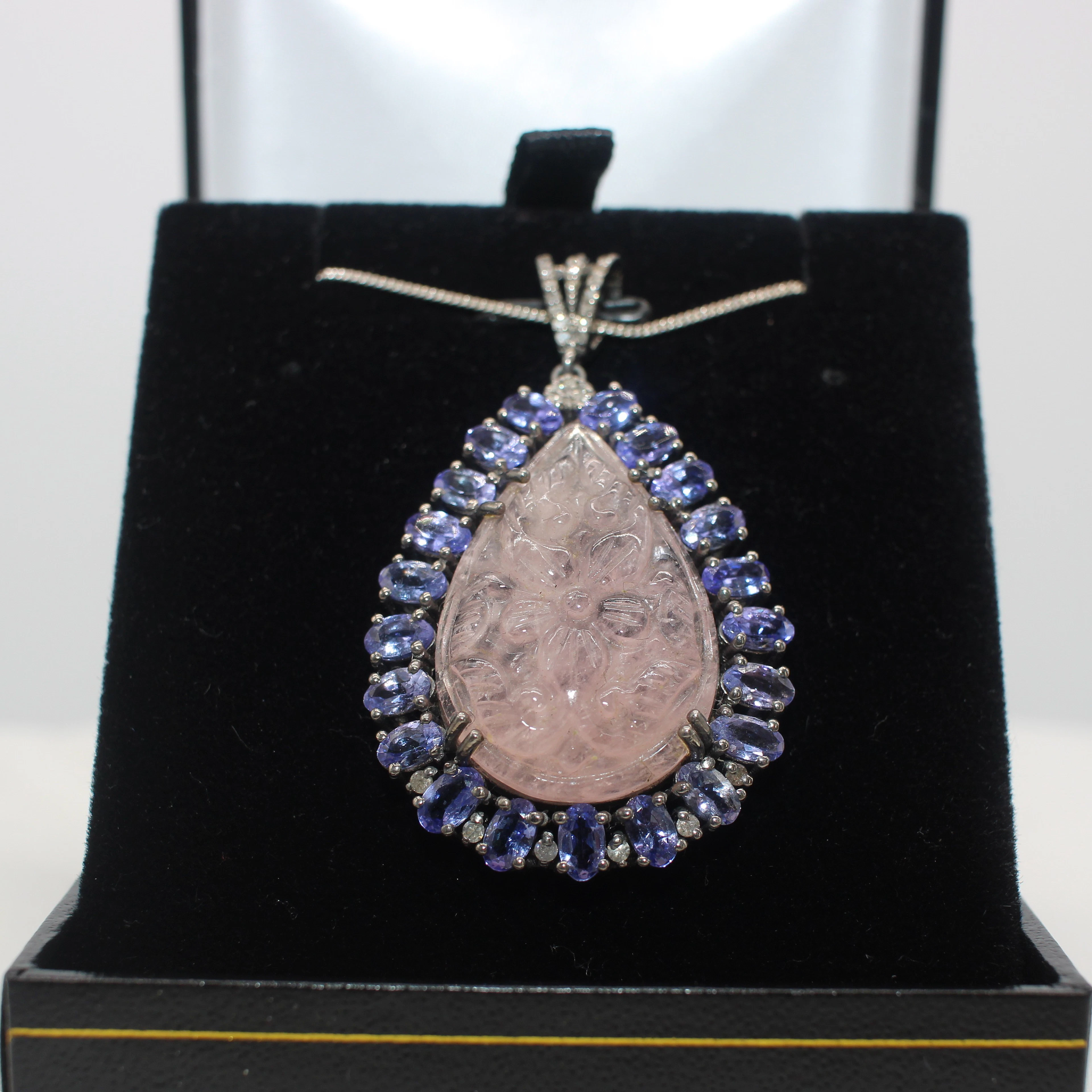 CARVED MORGANITE, TANZANITE AND DIAMOND NECKLACE.