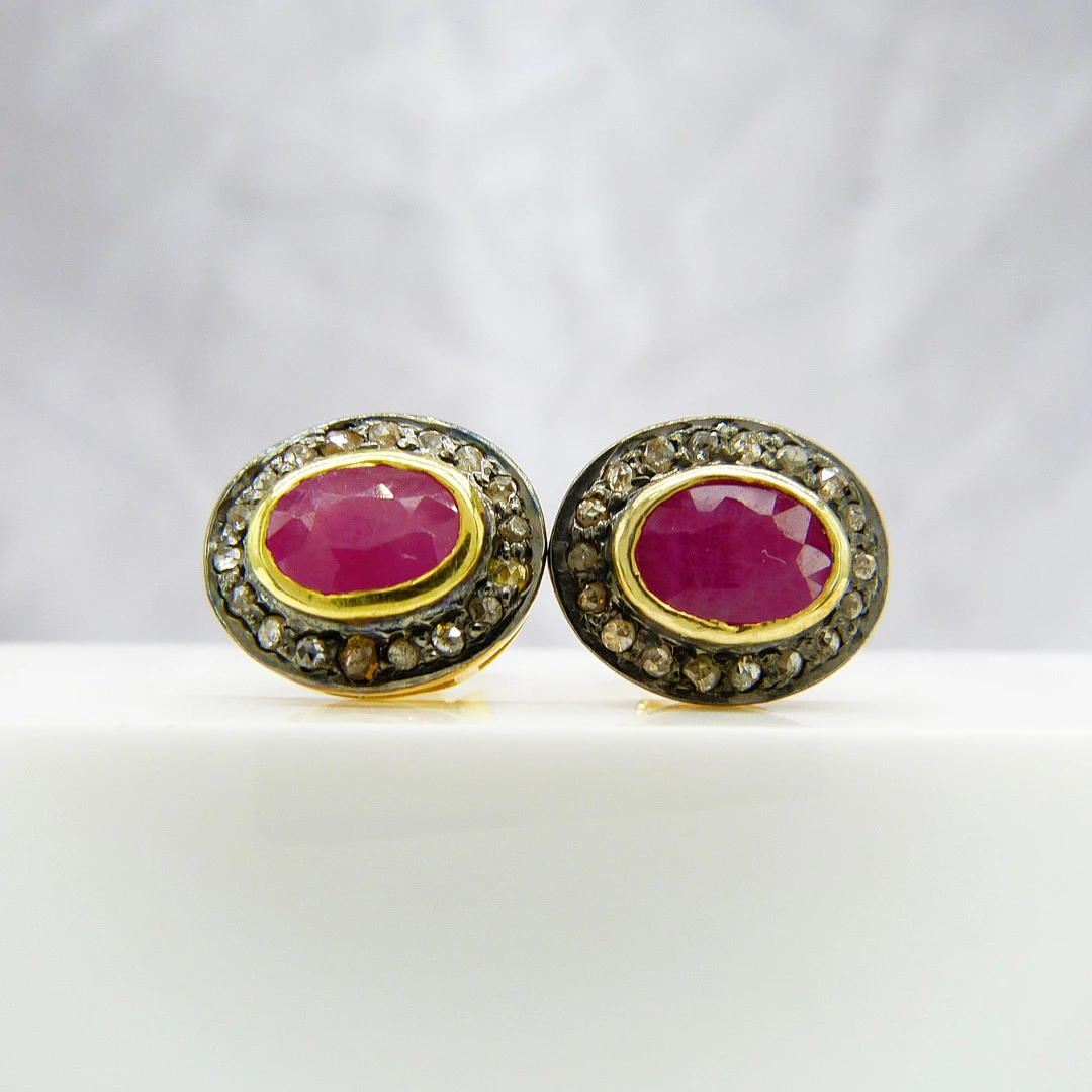 RUBY & DIAMOND EAR STUDS.