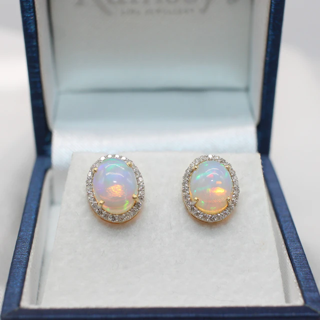 14K GOLD, CABOCHON OPAL & DIAMOND EAR STUDS.