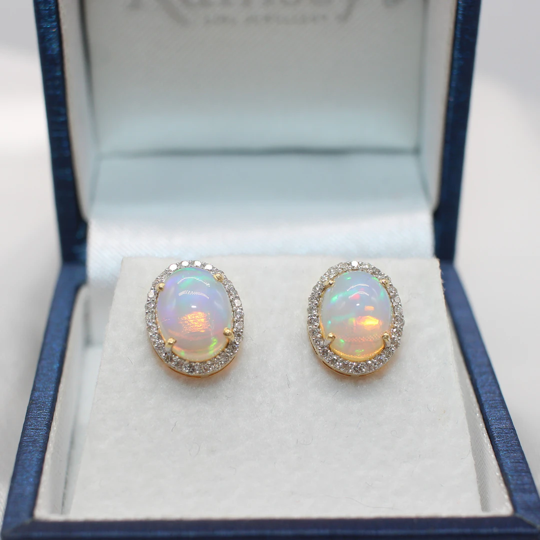 14K GOLD, CABOCHON OPAL & DIAMOND EAR STUDS.