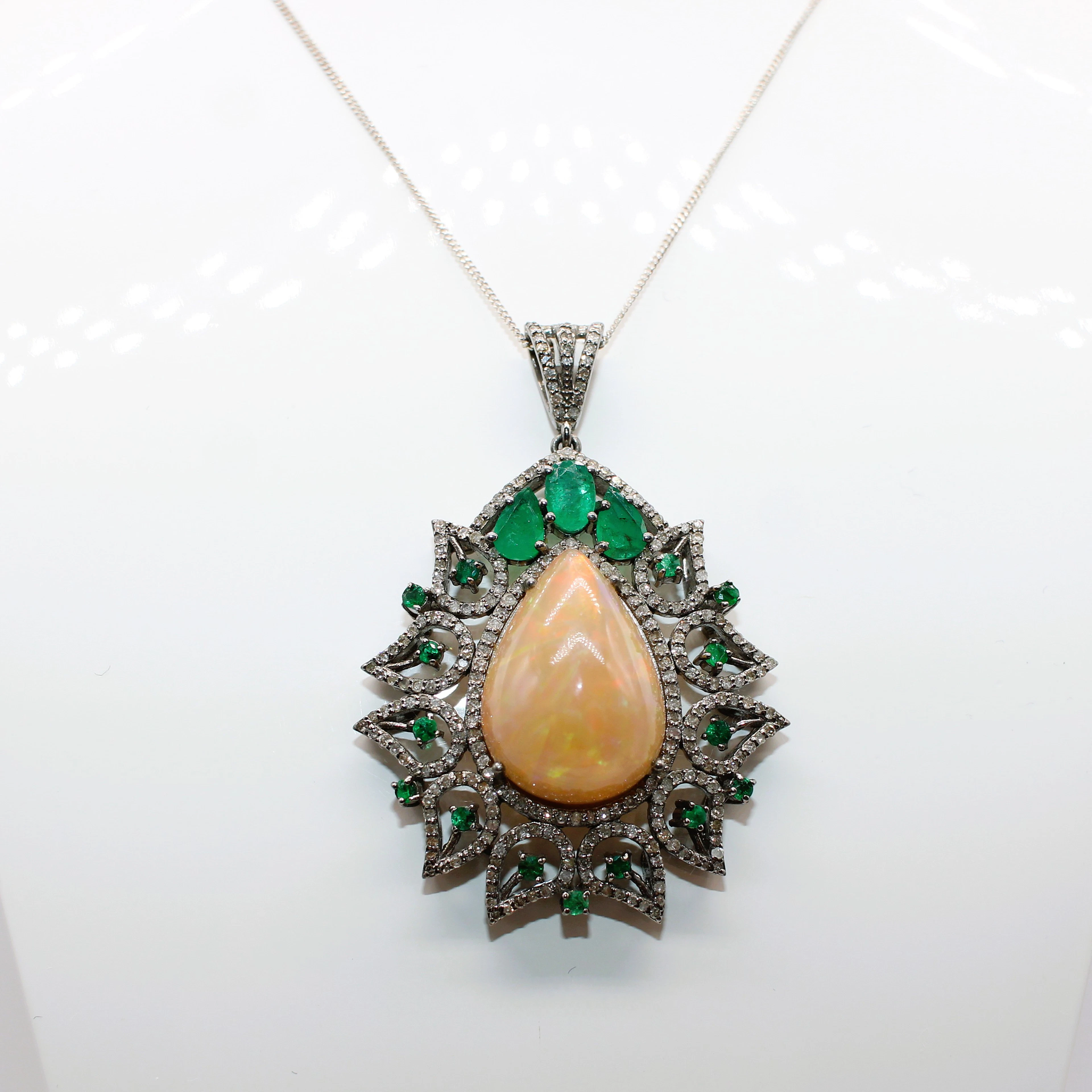 LARGE OPAL, EMERALD & DIAMOND PENDANT.