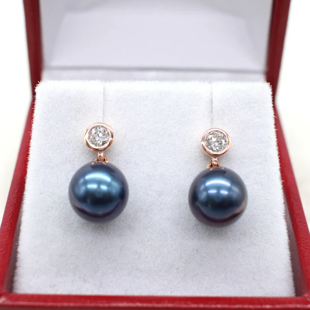 IRIDESCENT PEARL & DIAMOND EARRINGS.