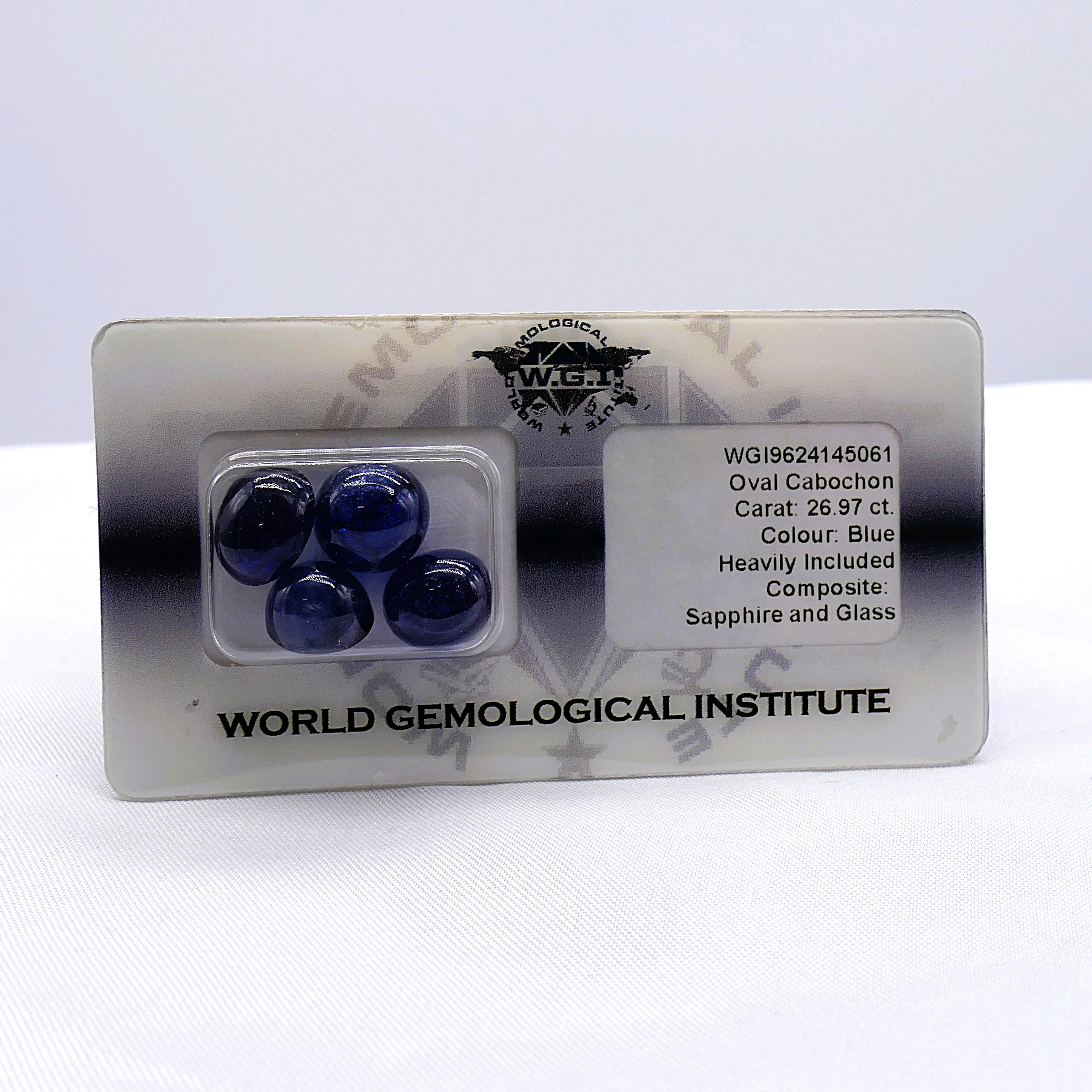 A PARCEL OF 4 CABOCHON SAPPHIRES.