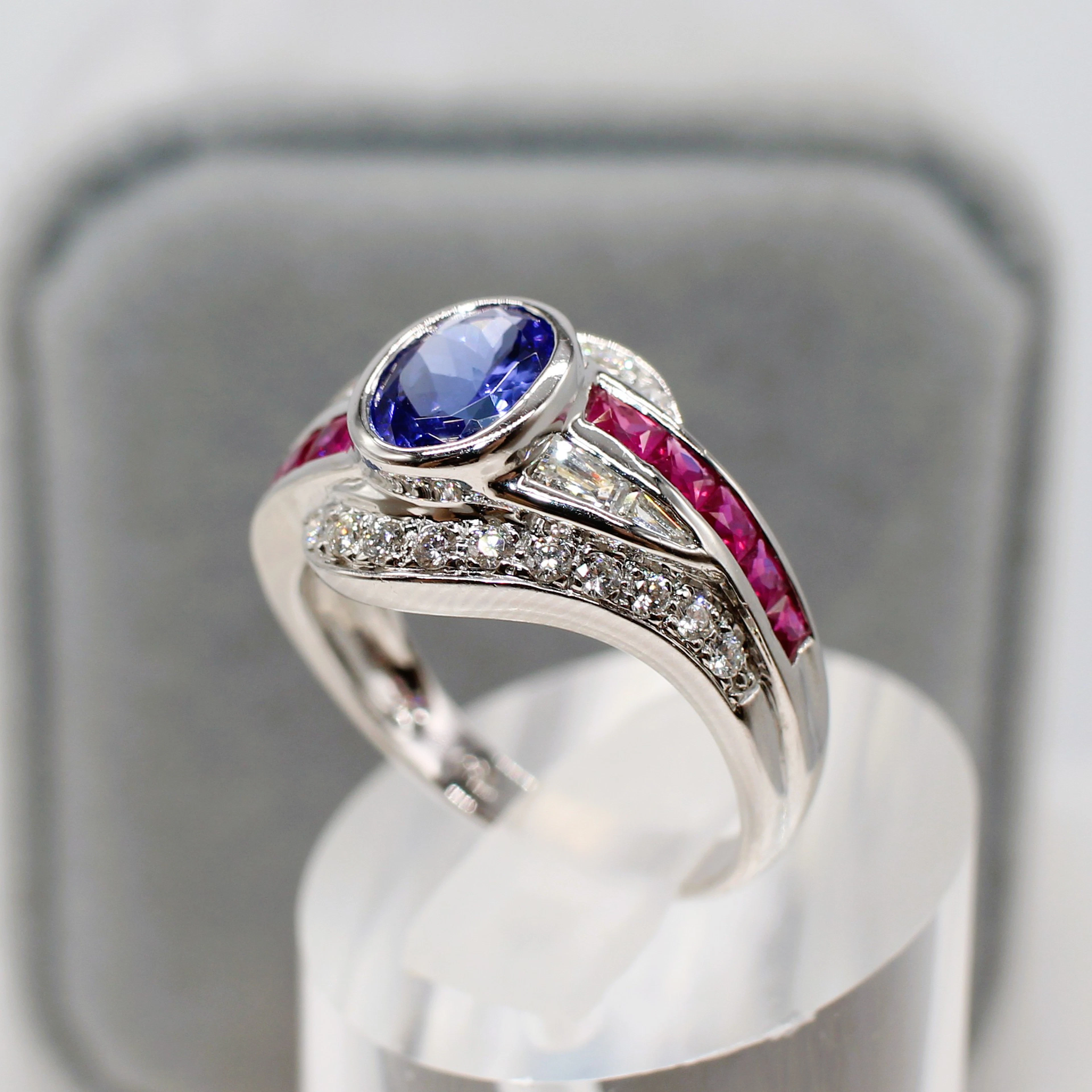 TANZANITE, RUBY & DIAMOND DRESS RING.