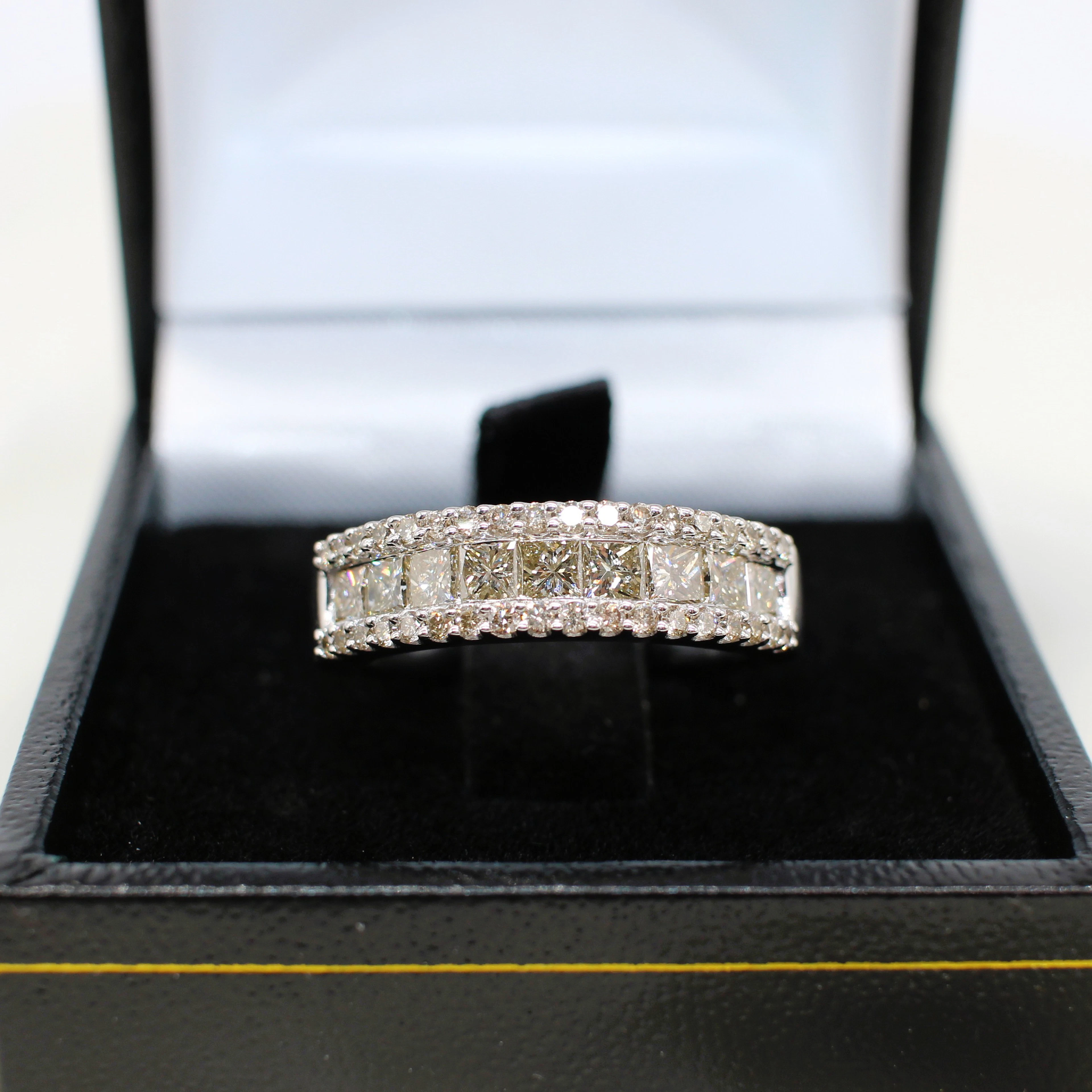 1.31CT DIAMOND HALF ETERNITY RING.