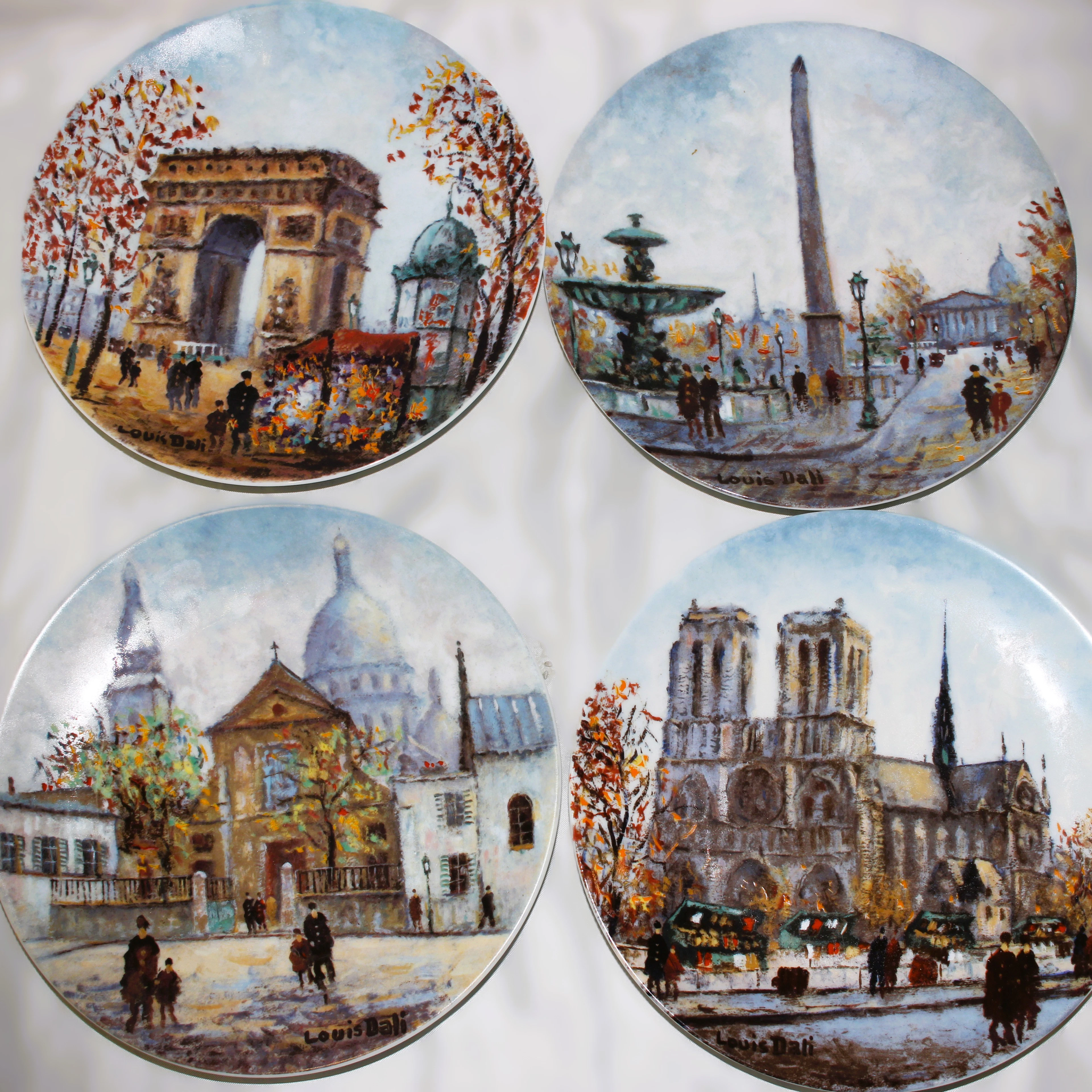 LOUIS DALI DECORATIVE PLATES X 4.