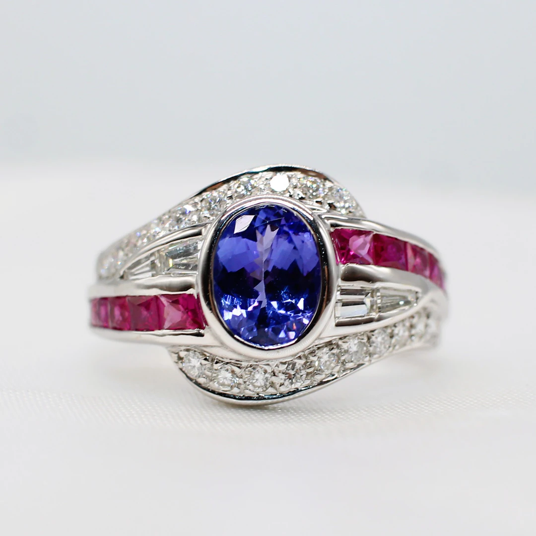 TANZANITE, RUBY & DIAMOND DRESS RING.