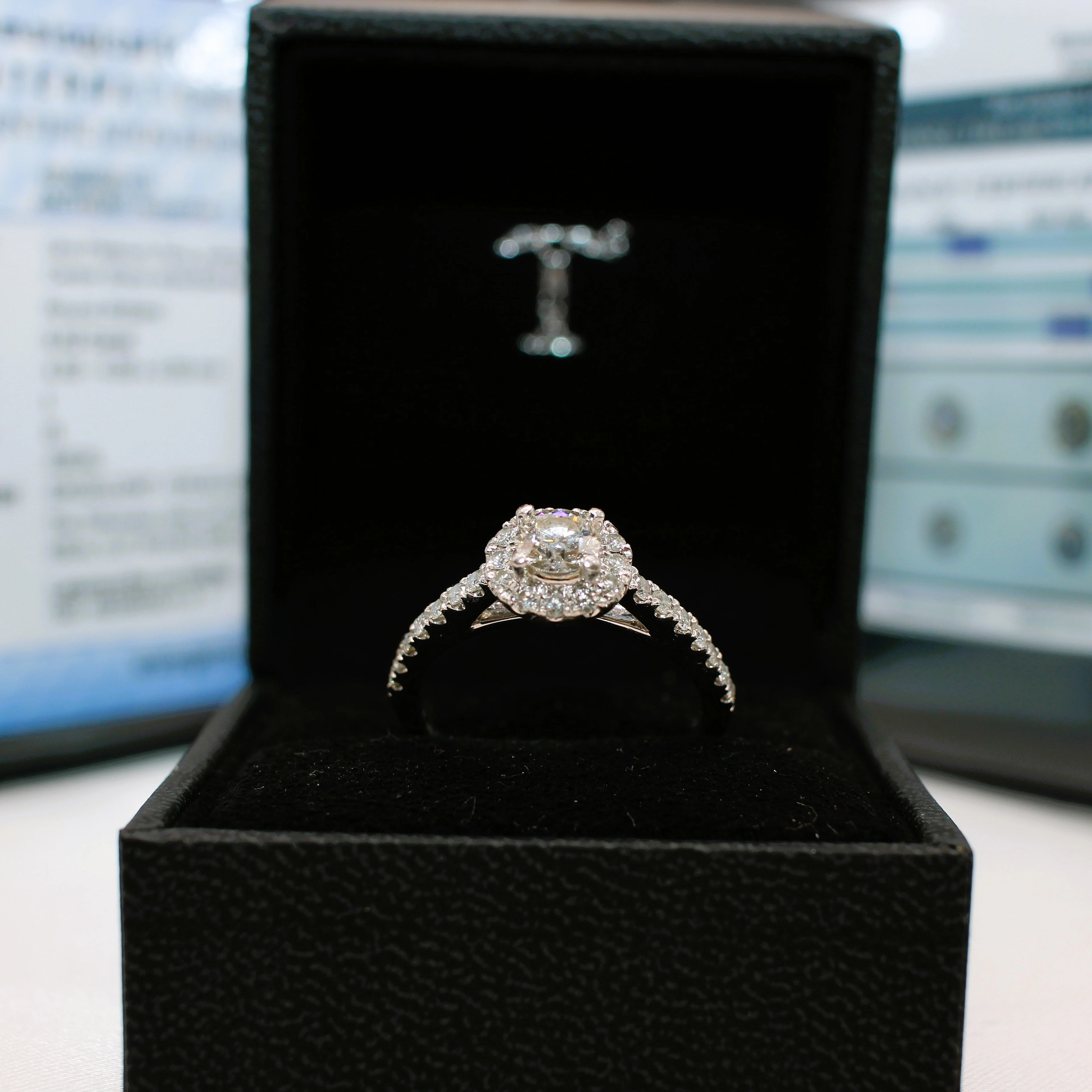 TOLKOWSKY CERTIFIED DIAMOND RING.