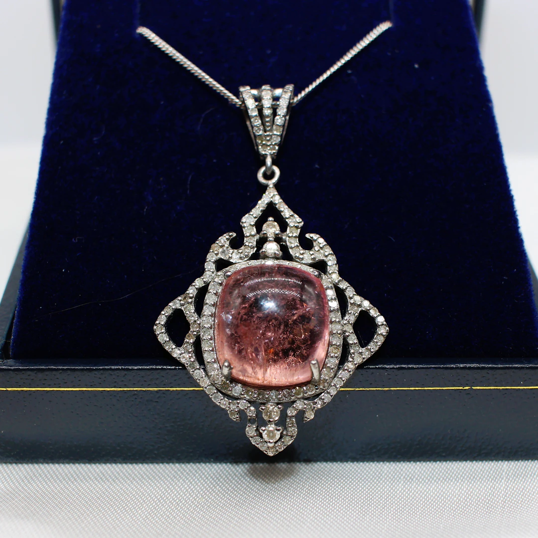 PINK CABOCHON TOURMALINE & DIAMOND PENDANT NECKLACE.