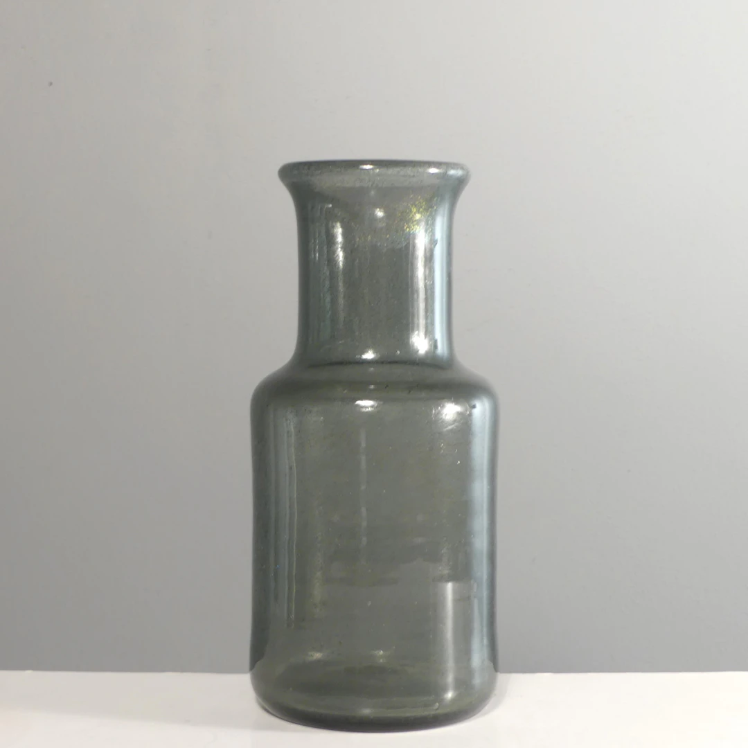 ERIK HÖGLUND. vas, glas. Signerad.