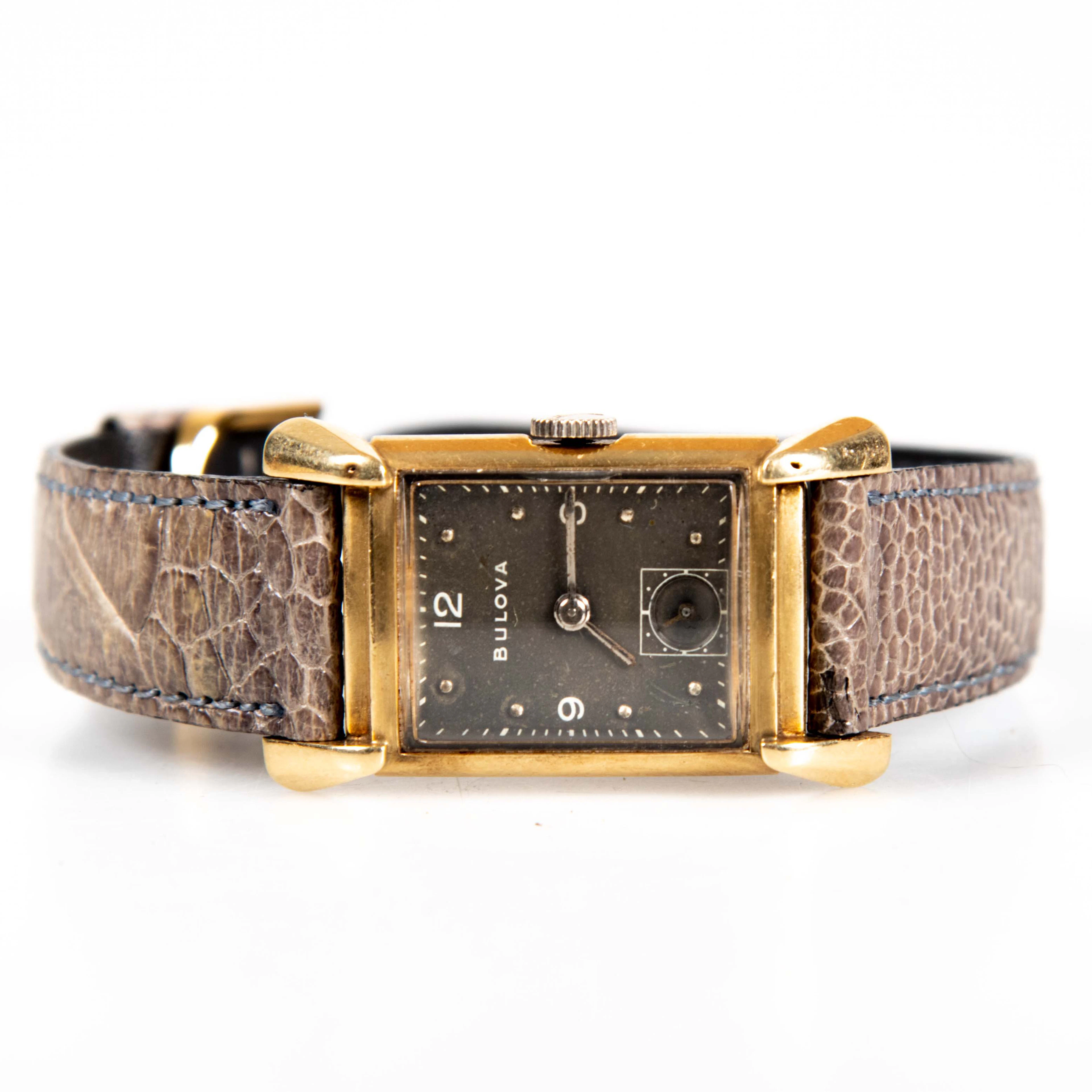 BULOVA ARMBANDSUR 14 K GULD.